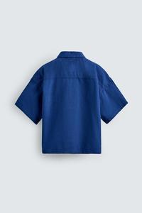 Polo homme sur mesure en coton doux bleu foncé avec col demi-zip et poche, vente en gros - Product Image 4