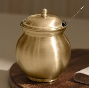Stunning hammered copper ghee pot comes with a matching lid and a sleek <b>serving</b> <b>spoon</b>. Available at wholesale price. - Product Image 6