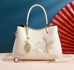 Cream Embroidered Lily Handbag with Leaf Charm and <b>Adjustable</b> Strap Fashionable jewelry clutch bag luxury faction bag - Product Image 1