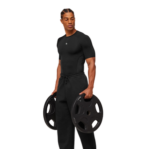 T-shirt de compression noir pour homme – Vêtement de sport et d'entraînement avec extensibilité confortable - Product Image 5