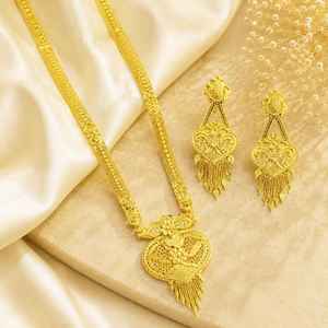 Venta al por mayor de collares largos tradicionales de oro laminado de 14K, 18K, 24K, joyería de moda, conjunto de joyería de latón chapado en oro de micras. - Product Image 1