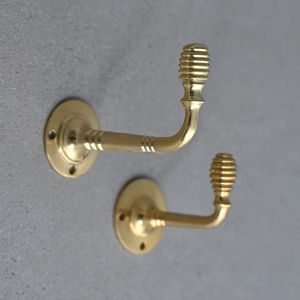 Modern brass wall coat <b>hook</b> designed for practical storage convenience while enhancing sophisticated household interiors - Product Image 6