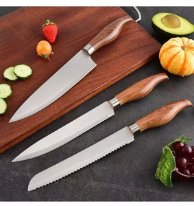 Juego de cuchillos de cocina de acero inoxidable de 7 piezas con soporte giratorio para herramientas. El mango con textura de madera simulada se adapta a la ergonomía. - Product Image 2