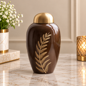 Urne commémorative botanique en métal brun avec incrustation de feuilles d'or, finition lisse, couvercle en dôme et forme compacte pour souvenir commémoratif - Product Image 1