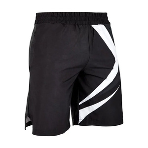 กางเกงชกมวย MMA UFC พิมพ์ลายโลโก้ตามสั่ง ด้วยเทคนิคการพิมพ์แบบรีดร้อน ผลิตจากโพลีเอสเตอร์ 100% คุณภาพดี ดีไซน์สำหรับผู้ชาย - Product Image 4