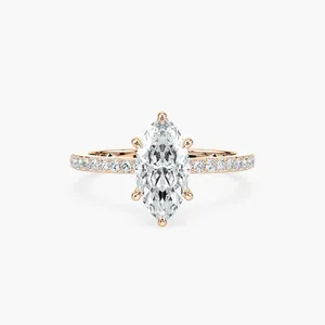 Anillo de compromiso solitario con diamante marquise de 1.50 quilates, engaste de seis puntas con media banda de diamantes redondos en oro rosa y blanco. - Product Image 1