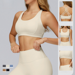 Sujetador deportivo sin costuras con cuello redondo y espalda cruzada para mujer, con logo frontal, para yoga y fitness, soporte medio, transpirable y de secado rápido - Product Image 2