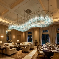 Lustre suspendu ovale en verre personnalisé en forme de goutte d'eau avec télécommande pour hall d'hôtel, luminaire de projet moderne en acier inoxydable