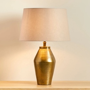 Golden Vessel Metal Table Lamp with Sculpted Iron Base Premium Fabric <b>Shade</b> Warm Ambient <b>Lighting</b> for Elegant Interiors - Product Image 2