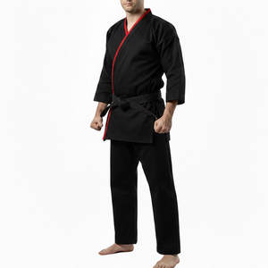 Kimono de karaté de style traditionnel, avec coutures renforcées et tissu épais pour un entraînement intensif au karaté. - Product Image 1