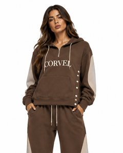 Ensemble coordonné en polaire zippé pour femme avec sweat à capuche à poche et détails latéraux à boutons-pression, et pantalon de survêtement coupe ample – Fournisseur en gros - Product Image 4