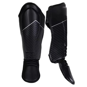 Protector de espinilla de cuero PU para adultos, color negro, con cierre de gancho y bucle, equipo de protección para deportes en todas las estaciones - Product Image 1