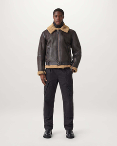 Chaqueta de hombre de cuero genuino marrón con cuello de piel y cremallera. - Product Image 1