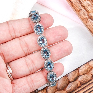Wholesale 925 Sterling Silver Natural Oval Blue Topaz Cubic Zirconia Halo Tennis Bracelet Memoria Jewels - Product Image 1