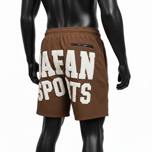 กางเกงว่ายน้ำชายคุณภาพสูง 140 GSM แห้งเร็ว ผลิตจากโพลีเอสเตอร์ สีน้ำตาลครีม ปักโลโก้ด้วยผ้าเชนิลล์ เหมาะสำหรับใส่ไปชายหาด - Product Image 2