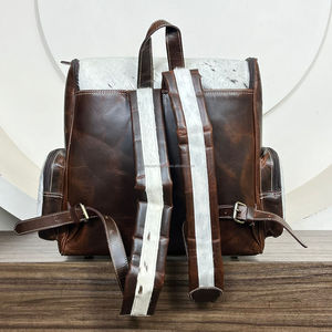 กระเป๋าผ้าอ้อมเด็กหนังวัวแท้ลายฉลุแฟชั่นใหม่ปี 2025 ประดับด้วยหินเทอร์ควอยซ์ กระเป๋าเป้สะพายหลังสำหรับเดินทางกลางแจ้งสุดหรูสำหรับผู้หญิง - Product Image 5