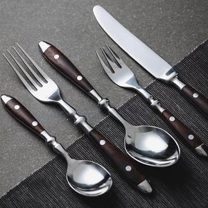 Juego de cubiertos metálicos duraderos para restaurantes con peso equilibrado, manejo cómodo y brillo duradero. - Product Image 1