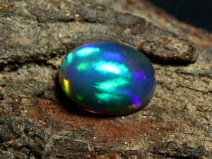 โอปอลเอธิโอเปียสีดำทรงคาโบชอง, พลอยหลวมสีรุ้ง, โอปอลรูปไข่หลากสีสำหรับทำเครื่องประดับ, พลอยหายากสำหรับนักสะสม - Product Image 1