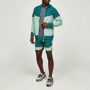 Conjunto Deportivo de Dos Piezas para Hombre, Chaqueta Cortavientos Delgada y Pantalones Cortos de Nailon y Poliéster, Traje Deportivo con Capucha para Verano - Product Image 1