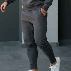 Pantalon de survêtement polaire pour homme, taille élastique, poches latérales, décontracté, pour l'automne, mi-lourd, tricoté, teint uni, respirant, en coton personnalisé - Product Image 1