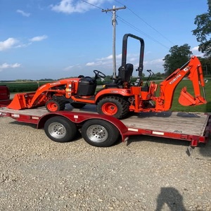Tracteur de jardin robuste Kubota BX23S 4x4 avec chargeur frontal et pelle arrière, tracteur utilitaire 40 CV pour travaux exigeants - Product Image 1