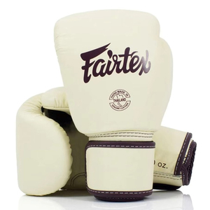 นวมชกมวยรุ่นล่าสุด Fairtex Pro หนังวัวแท้คุณภาพพรีเมียม สายรัดปรับได้ เหมาะสำหรับฝึกซ้อมและการแข่งขัน - Product Image 1