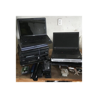 Ordinateurs portables en vrac, unités informatiques variées pour le recyclage, la remise à neuf et la formation technique