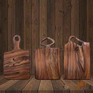 Rustic wood chopping board made from reclaimed teak wood with deep groove for meat carving and vegetable preparation - Product Image 1