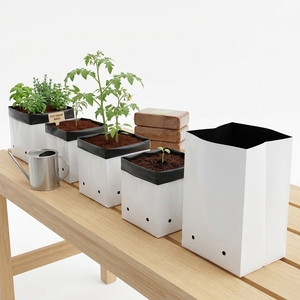 Overseas Exim <b>Plastic</b> PP Grow Bag-Black/White Multi-Shaped Holes Drip Irrigation Hydroponics Indoor Gardening Eco-Friendly - Product Image 1