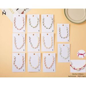 Colliers à perles tendance en 14 pièces avec breloque coquillage - Product Image 1