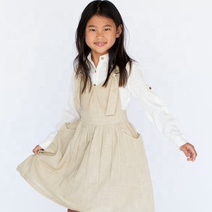 Gorgeous Girl's Wear Beige Overall Dress & Shirt With Knotted Shoulder <b>Straps</b> & Front Pockets Crafted From Cotton For Comfort - Product Image 1