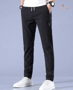 Pantalon de sport décontracté pour homme en coton et soie glacée, à séchage rapide, extensible, couleur unie, taille mi-haute, coupe droite, ample, respirant et léger - Product Image 1