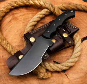 Couteau de chasse artisanal Tracker en acier au carbone avec lame thermolaquée et manche en micarta blanc - Product Image 1