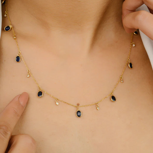 Collier vintage en or 18 carats avec saphir bleu et diamants sertis clos, chaîne serpent - Product Image 1