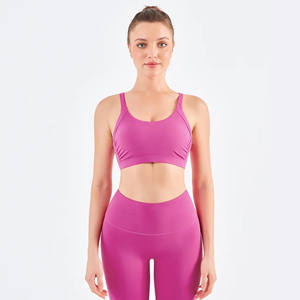 Conjuntos de yoga de lujo color rosa para mujer, para gimnasio, fitness y entrenamiento, top corto sin mangas con logo de yoga bordado. - Product Image 1