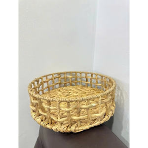 Panier de rangement rond fait main 2026 en jacinthe d'eau, un article de décoration naturelle pour la maison en provenance du Vietnam - Product Image 1