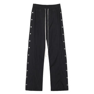 Pantalon de survêtement noir ample pour homme avec cordon de serrage et boutons latéraux, anti-plis, léger, style streetwear décontracté - Product Image 1
