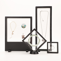 Boîte rigide transparente anti-oxydation haut de gamme avec support flottant 3D pour boucles d'oreilles et bijoux, doublée d'éponge