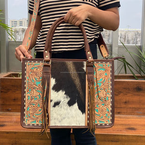 Nueva venta al por mayor 2025 de fábrica de moda de gran capacidad patrón Floral hecho a mano cuero de vaca genuino borla bolso de mano con cremallera - Product Image 4