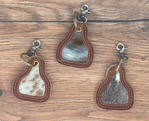 Nuevo diseño Venta caliente pelo en cuero de vaca llavero llaveros de cuero llaveros elegantes forma única llaveros de lujo de cuero - Product Image 4