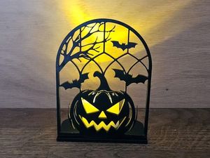 Portavelas de Halloween con forma de calabaza de metal, estilo Jack-O'-Lantern, con acabado mate negro premium y recubrimiento en polvo. - Product Image 6