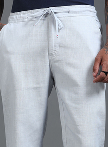 Premium Cotton <b>Trousers</b> For <b>Men</b> Off <b>White</b> Solid Regular Fit Casual Woven Pants For Comfortable Everyday Wear And Summer Styling - Product Image 1
