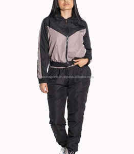 Custom Lightweight <b>Zipper</b> <b>Jacket</b> and Pant Set Ladies Wholesale Windbreaker Waterproof Nylon Tracksuit Set For Women - Product Image 1