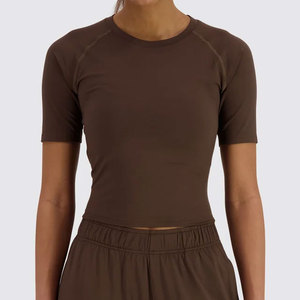 เสื้อครอปท็อปออกกำลังกายสำหรับผู้หญิง ผ้าเจอร์ซีย์รัดรูป ยืดได้สี่ทิศทาง เหมาะสำหรับการฝึกซ้อมกีฬา เสื้อยืดครอปท็อปแบบถัก - Product Image 5