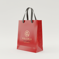 Sacs en papier de luxe personnalisés faits à la main par un fabricant vietnamien, avec logo brillant laminé, pour boutiques, supermarchés et cadeaux.