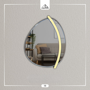 Es un espejo decorativo moderno de forma orgánica con LED acrílico, diseñado para realzar cualquier espacio habitable. - Product Image 3