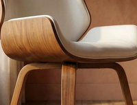 Chaise de réception vintage empilable en acier avec dossier croisé en X et coussin en rotin, idéale pour mariages et événements - Vente en gros