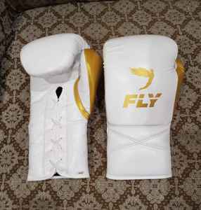 Professional Top Selling White & Golden Color High Quality Mauy Thai Genuine Cowhide Leather Customized Fighting Punching Gloves - Product Image 1