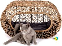 Comfortabele, kleine, zwarte rotanhol voor katten en honden om in te slapen, gemaakt van hout en bamboevezels.