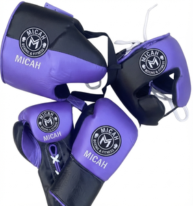 Ensemble de boxe en cuir comprenant une paire de gants, un protège-tête et un protège-guêtres - Équipement de kickboxing confortable - Product Image 1